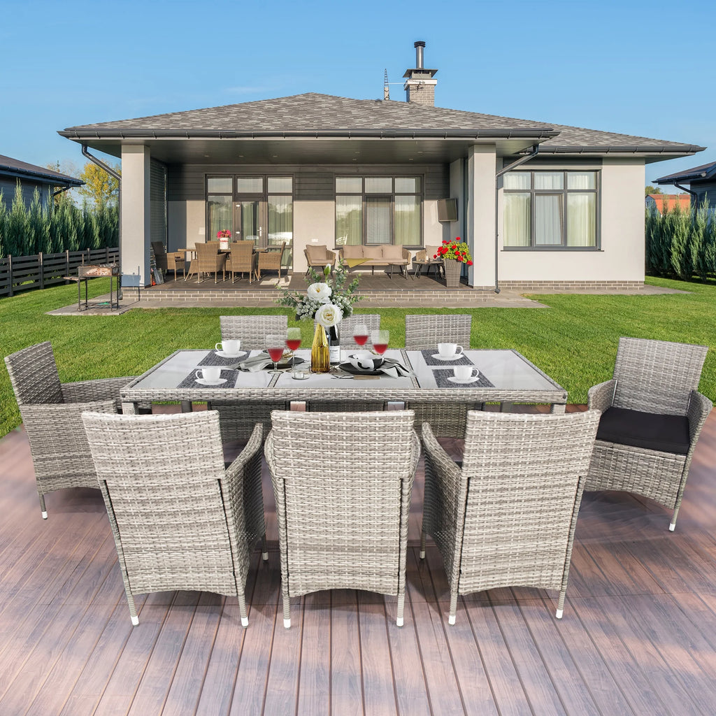 9 Pieces Wicker Outdoor Dining Set with Glass Tabletop and Cushioned Chairs H372307